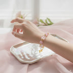 Pink cat's eye stone & alloy gold-plated & acrylic