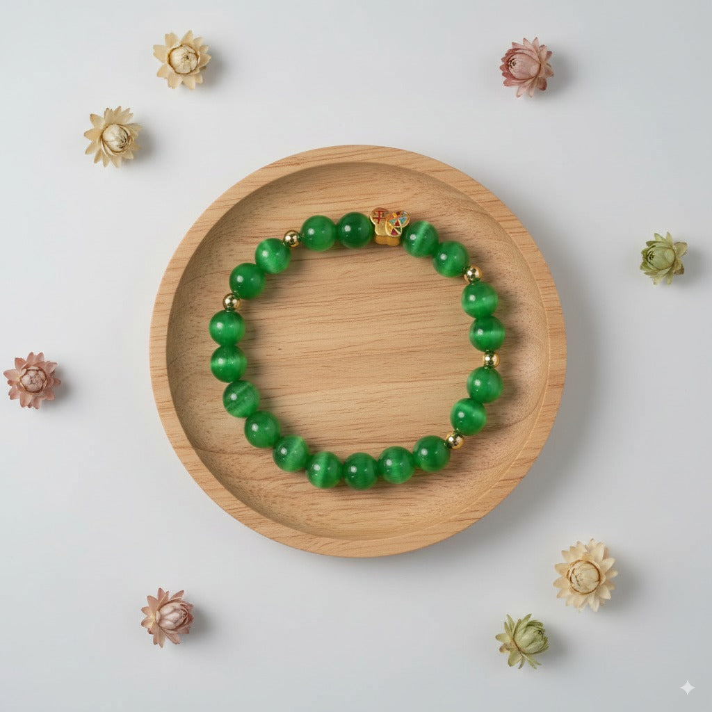 Green cat's eye stone & Colored enamel